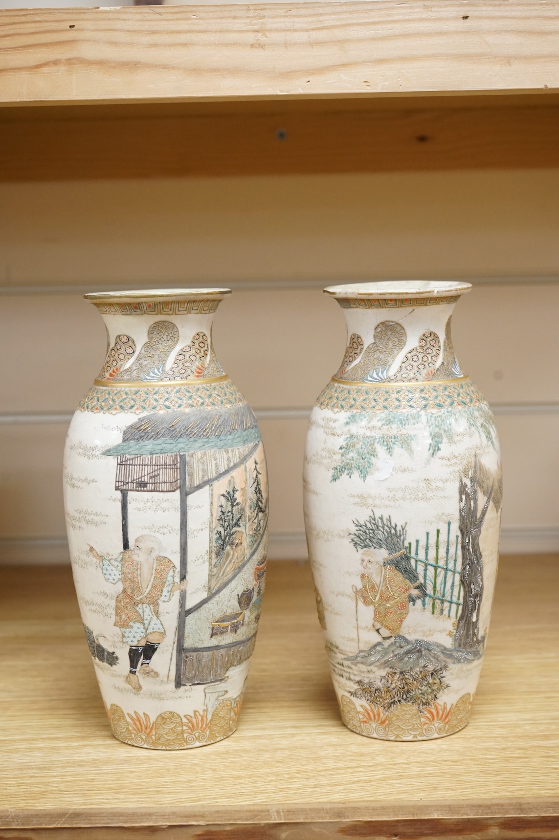 A pair of Japanese Satsuma vases,Meiji period, signed, 23cm